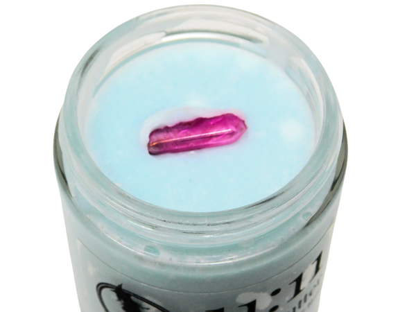 top view of the pink aura quartz on top of 11:11 body butter