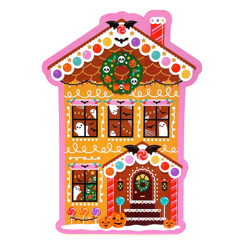 A colorful vinyl sticker depicting a gingerbread haunted house with candy Canes and Halloween decorations.