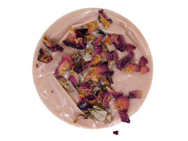back of Aphrodite soap embedded with rose petals