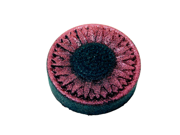 side view of black sunflower bath bomb to show black base 