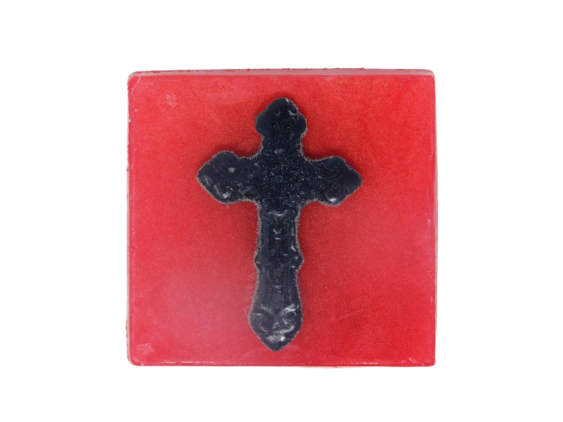 pink square shaped soap with black gothic cross