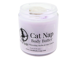 lavender colored body butter topped with moonstone in 4 oz glass jar with label that reads: Cat Nap Body Butter/ Flowering Herbs & Airy Linens, 
