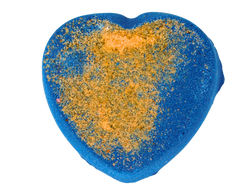 dark blue heart shaped bath bomb with gold himalayan salt on top;