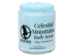 light blue thick body scrub in glass jar that reads: celestial mountains body scrub. tulips & himalayan salt.