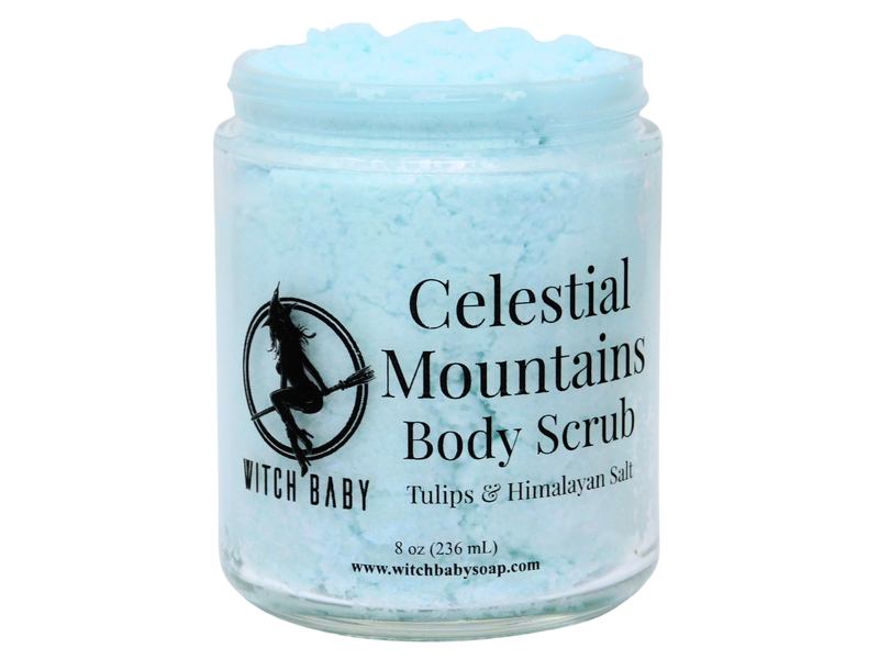 light blue thick body scrub in glass jar that reads: celestial mountains body scrub. tulips & himalayan salt.
