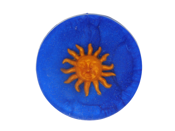navy blue circular soap with gold sparkles and whimsigoth style gold sun sun on top