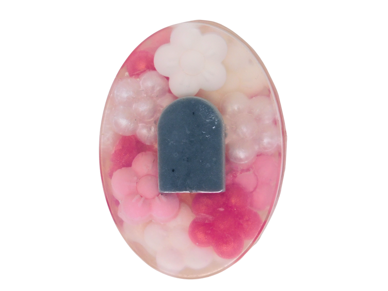oval soap clear soap with tomb stone and cherry blossoms in shades of pink and white surrounding it 