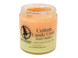 orange and yellow body butter topped with yellow agate in a 4 oz glass jar with a clear label that reads: Cotton Candy Corn Body Butter. Cotton Candy & Candy Corn. 