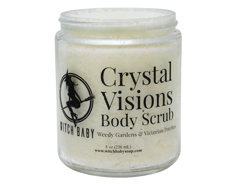 thick white body scrub in a glass jar with a label that reads Crystal Visions Body Scrub. Weedy Gardens & Victorian Porches.