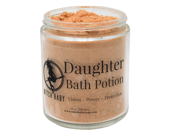 autumnal orange bath potion powder inside 8 oz glass jar with label that reads: Daughter Bath Potion. Vision - Power - Protection. 