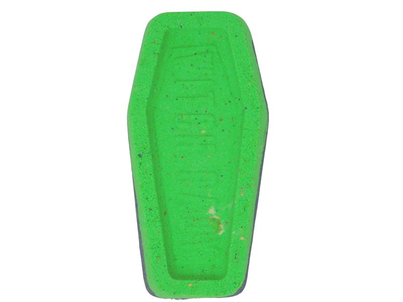 green coffin bath bomb with purple bottom