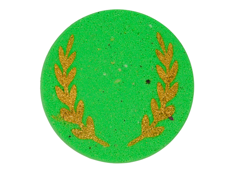 cicrular green bath bomb with grains of golden wheat airbushed on it