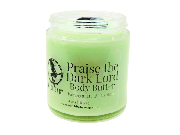green body butter packaged in 4 oz glass jar with label that reads: Praise the Dark Lord Body Butter. Pomegranate & Blasphemy.