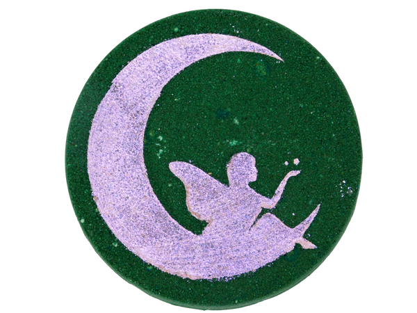 dark green circular bath bomb with pink glittery airbrush of a fairy on the moon
