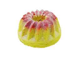 yellow bundt cake bath bomb with strawberry and glitter on top