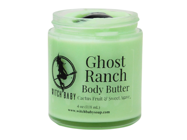 ghostly green body butter in glass jar that reads: Ghost Ranch Body Butter Cactus Fruit & Sweet Agave
