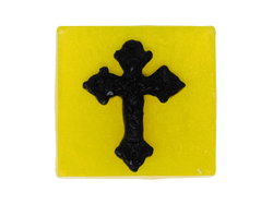 square yellow soap with gothic black cross on top