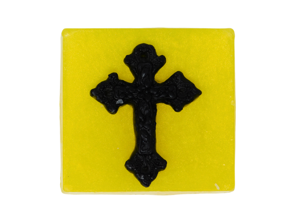 square yellow soap with gothic black cross on top