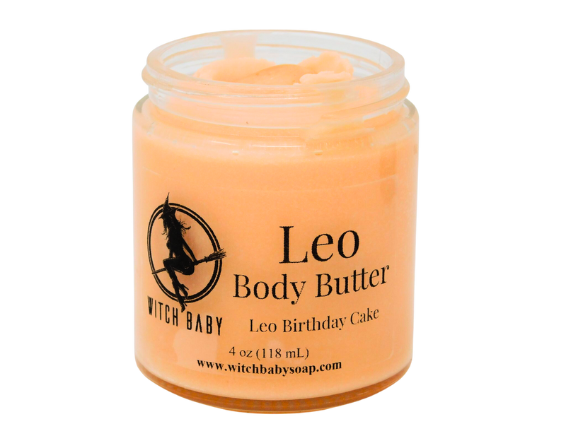 orange body butter topped with citrine in a 4 oz glass jar with clear label that reads: Leo Body Butter. Leo Birthday Cake. 