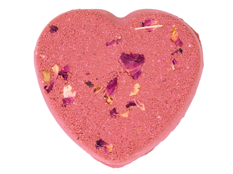 pink heart shaped bath bomb with roses on top