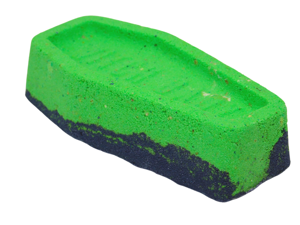 side view of green and purple coffin casket bath bomb