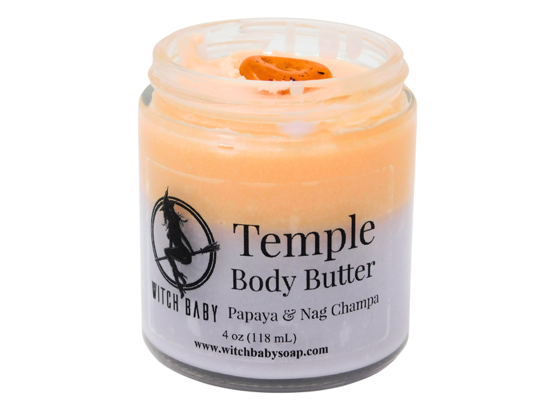 orange and purple body butter in 4 oz glass jar topped with carnelian. Clear label reads: Temple Body Butter. Papaya & Nag Champa. 
