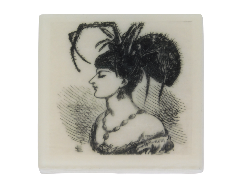 square soap with vintage illustration of a lady with a spider on her head