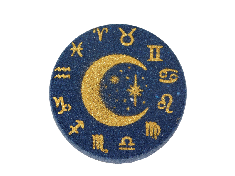 deep blue circular bath bomb air brushed with gold moon and stars surrounded by astrology symbols