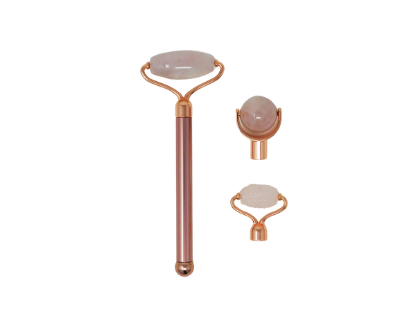 Rose gold, Pink and rose quartz face rollers. Circular and spherical in nature. 