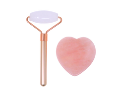 rose quartz face roller with rose gold colored handle and heart shaped rose quartz gua sha