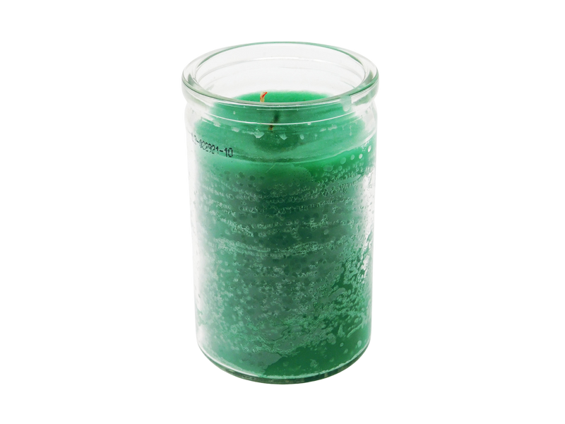 green candle in glass jar