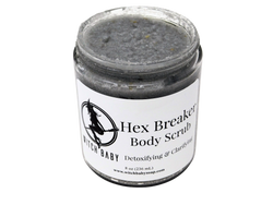 gray activated charcoal salt scrub in 8 oz glass jar with a label that reads: Hex Breaker Body Scrub. Detoxifying & Clarifying.
