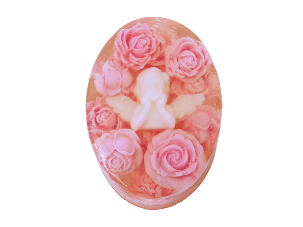 oval soap with white baby cherub in the center surrounded by pink roses