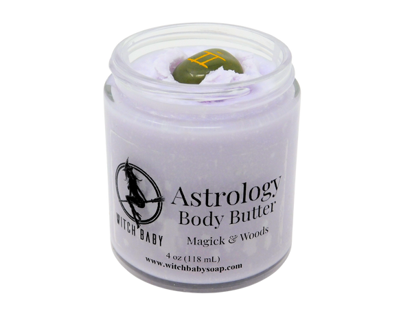 purple Astrology Body Butter packaged in a glass jar and topped with a green aventurine Gemini astrology crystal