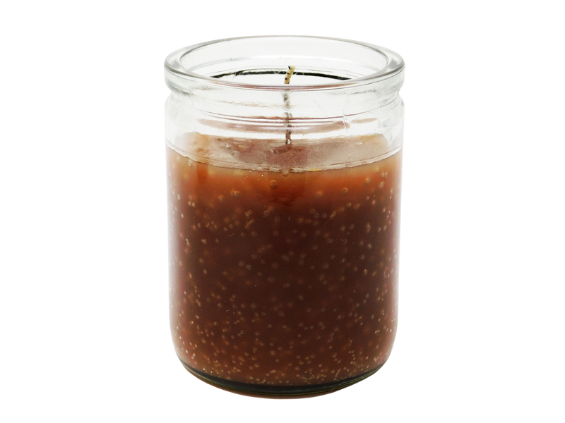 brown candle in glass jar