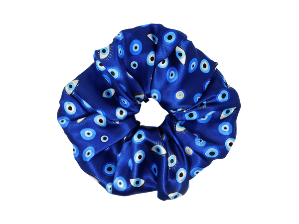 circular hair tie with varying eyeball designs in blue 