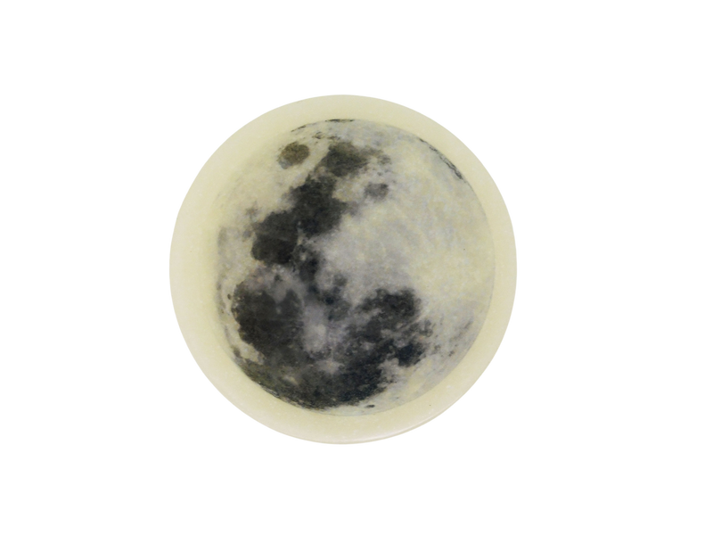 Glycerin soap with the image of a full moon on top. 
