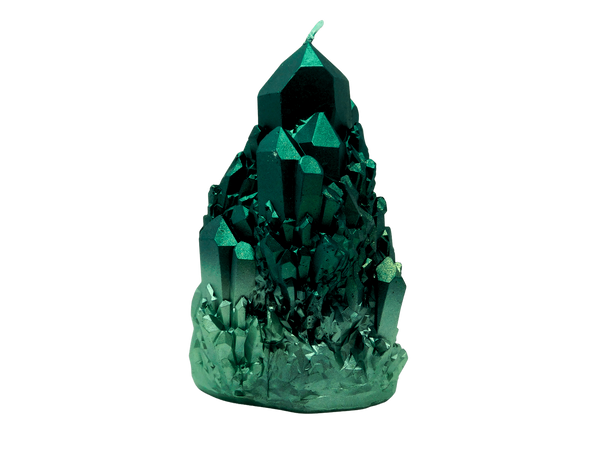 photo of an emerald green candle in the shape of a crystal