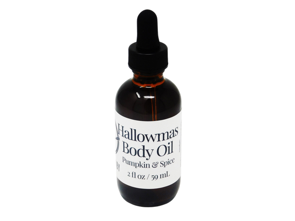 Amber colored 2 oz dropper bottle. Label says Hallowmas Body Oil Pumpkin and Spice