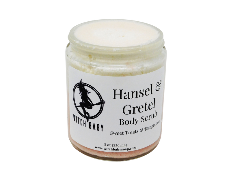 Half white and half pink thick buttery textured body scrub pictured in 8 oz (236 mL) glass jar. White label reads: Hansel & Gretel Body Scrub. Sweet Treats & Temptation. 
