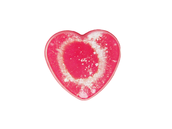 hot pink heart soap with gold tinted mica exploding from the center