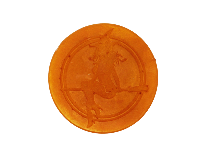 gold circular soap with witch baby logo engraved on top
