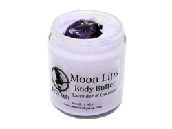 Light purple Moon Lips Body Butter packaged in a 4 oz glass jar and topped with an amethyst crystal. Label reads: Moon Lips Body Butter. Lavender & Coconut. 