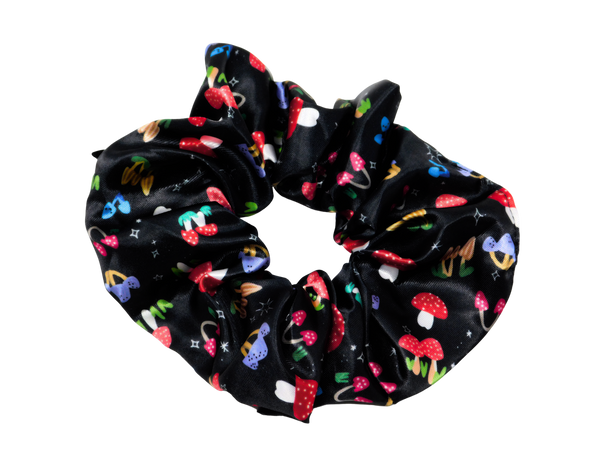Black hair tie with various mushroom designs in varying colors
