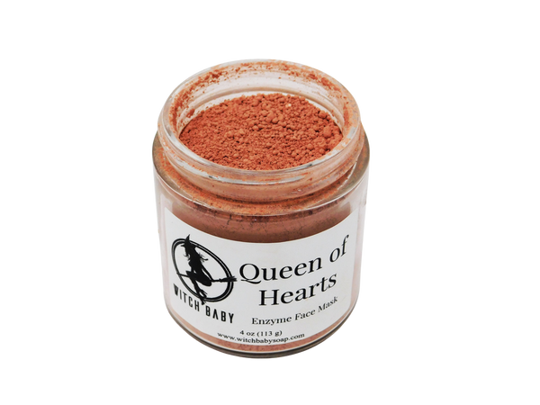 4 oz glass jar with pink face mask inside. Label says queen of hearts enzyme face mask 