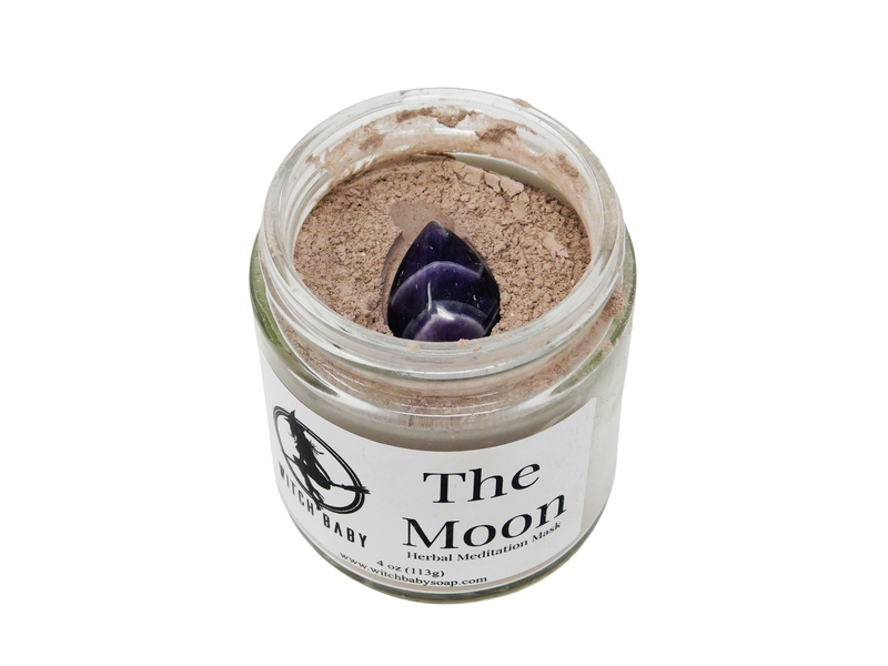 purple face mask in a 4 oz glass jar with amethyst tear drop on top 