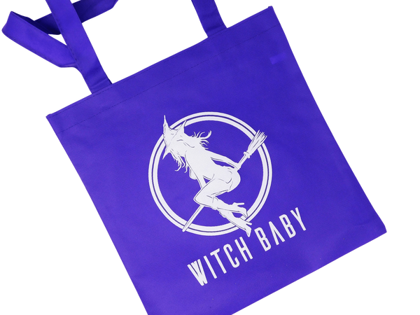 14" x 13 1/4" purple tote bag with Witch Baby logo.