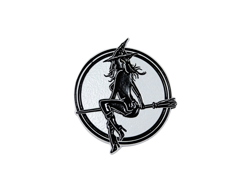 white enamel pin with witch baby logo 